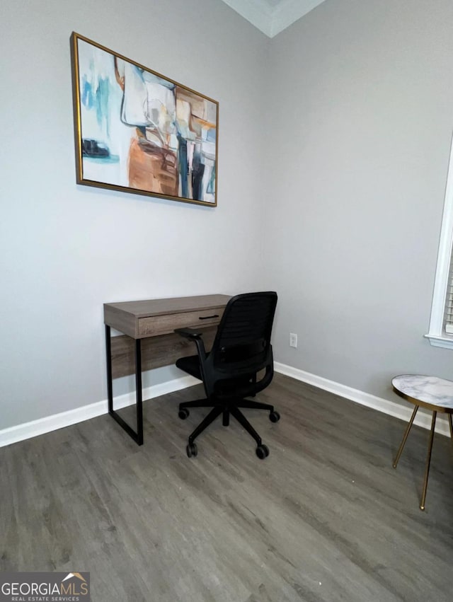 office area featuring baseboards and wood finished floors