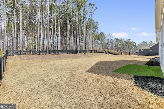 view of yard featuring fence