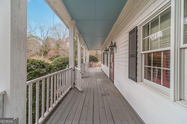 deck with covered porch