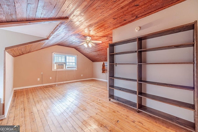 additional living space featuring lofted ceiling, wooden ceiling, light wood-style flooring, and baseboards