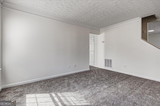 carpeted spare room with visible vents, crown molding, a textured ceiling, and baseboards