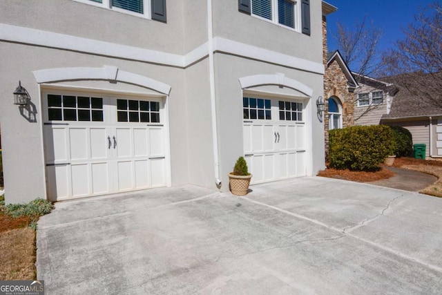 garage with driveway