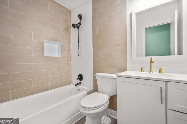 full bath featuring bathing tub / shower combination, vanity, toilet, and tile walls