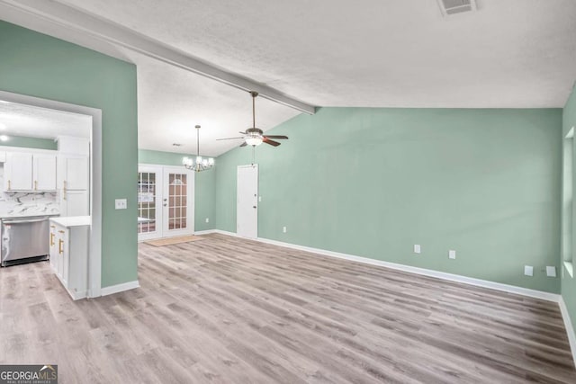 unfurnished living room with visible vents, baseboards, vaulted ceiling with beams, french doors, and light wood-type flooring