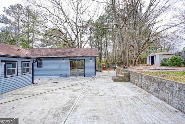 exterior space featuring an outbuilding and a storage unit