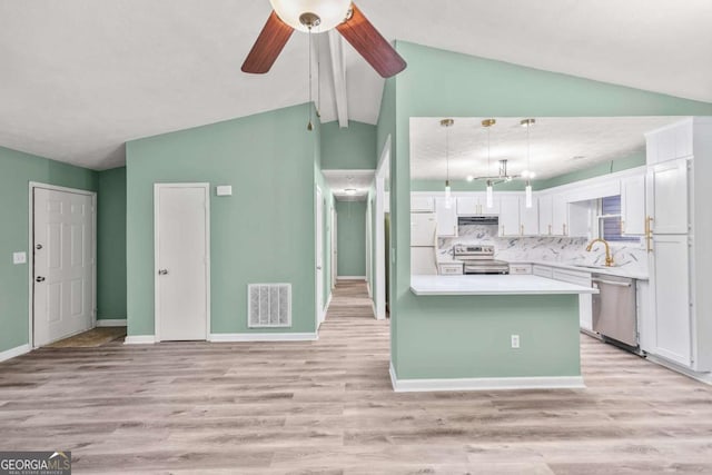 kitchen with visible vents, white cabinets, appliances with stainless steel finishes, light countertops, and light wood-style floors