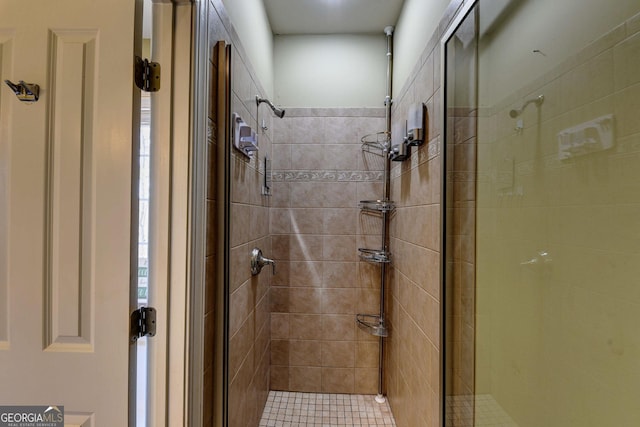 full bathroom featuring a shower stall