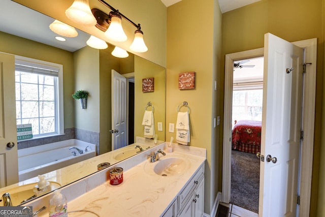 full bathroom featuring a bath, connected bathroom, and vanity