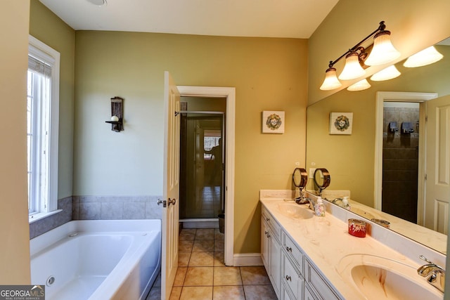 bathroom with tile patterned flooring, a bath, double vanity, and a shower