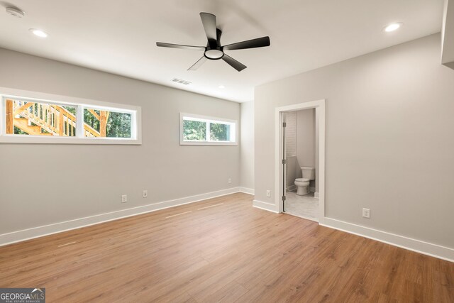 unfurnished bedroom featuring recessed lighting, visible vents, light wood-style flooring, and baseboards