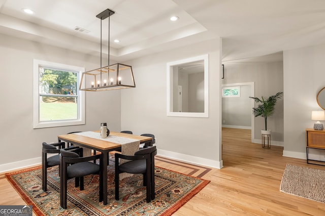 dining room with recessed lighting, visible vents, light wood finished floors, and baseboards