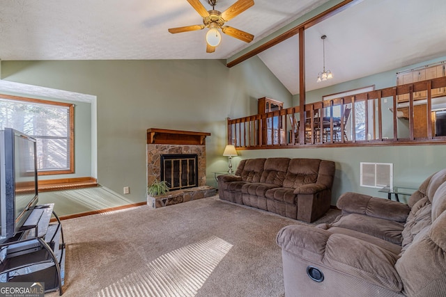 living room featuring baseboards, visible vents, vaulted ceiling with beams, carpet floors, and a fireplace