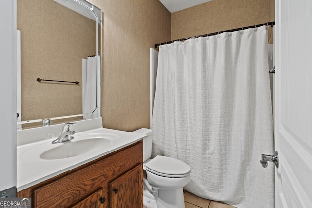 bathroom featuring toilet, tile patterned flooring, a shower with shower curtain, and vanity