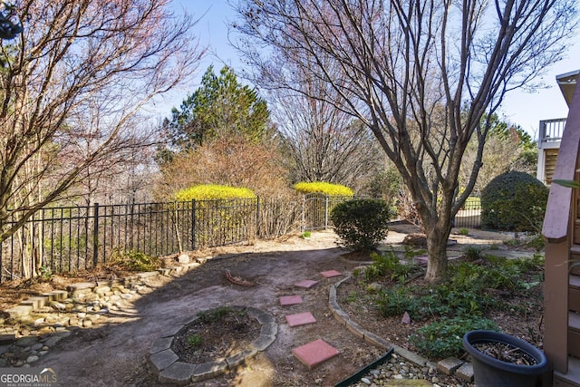 view of yard featuring fence