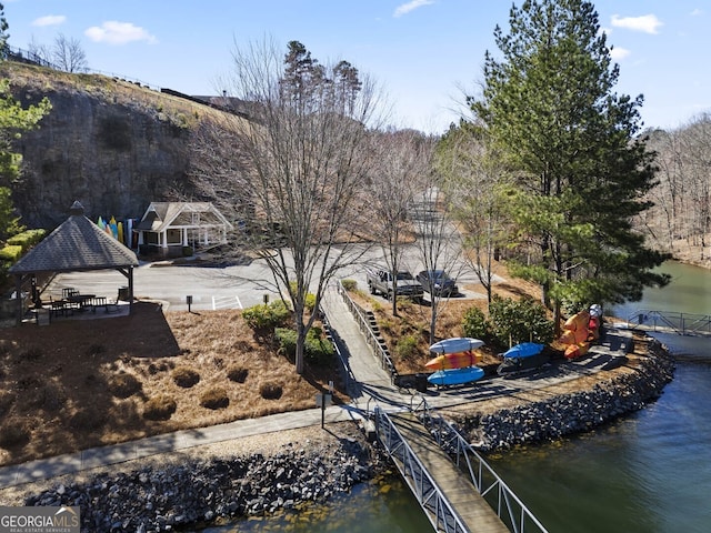 dock area featuring a gazebo and a water view