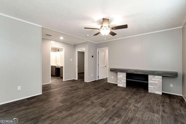 unfurnished living room with ceiling fan, dark wood-style flooring, a fireplace, baseboards, and crown molding