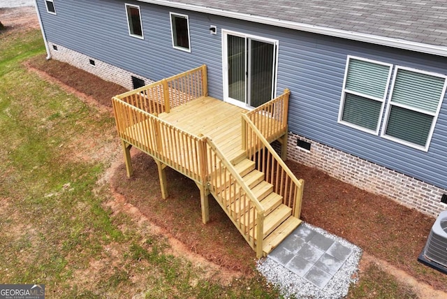 deck featuring central air condition unit and stairs