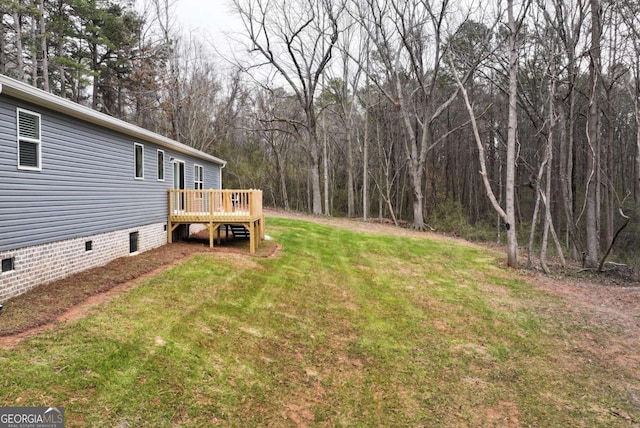 view of yard with a deck