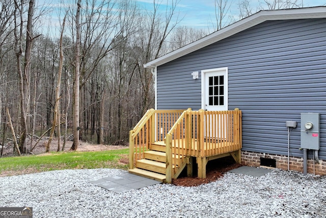 deck with a wooded view