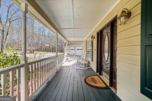 wooden terrace with covered porch