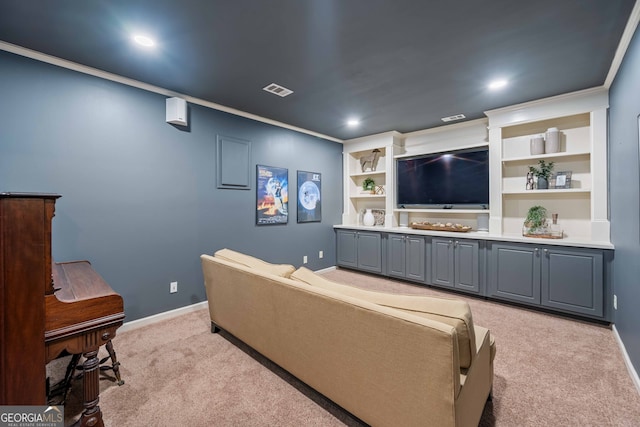 living area featuring visible vents, baseboards, carpet, and crown molding