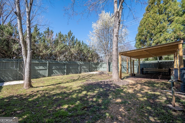 view of yard with a fenced backyard