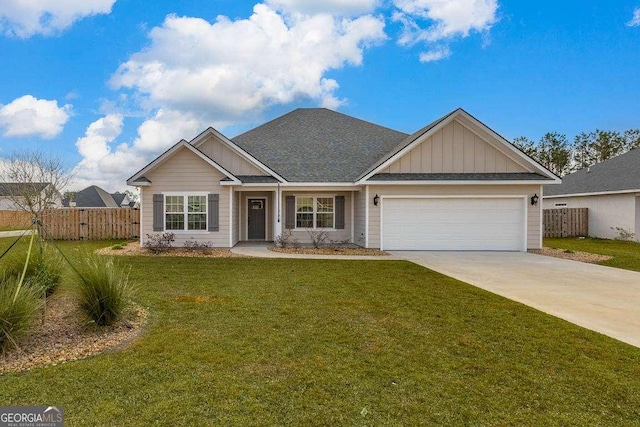 ranch-style home with driveway, board and batten siding, a front yard, and fence