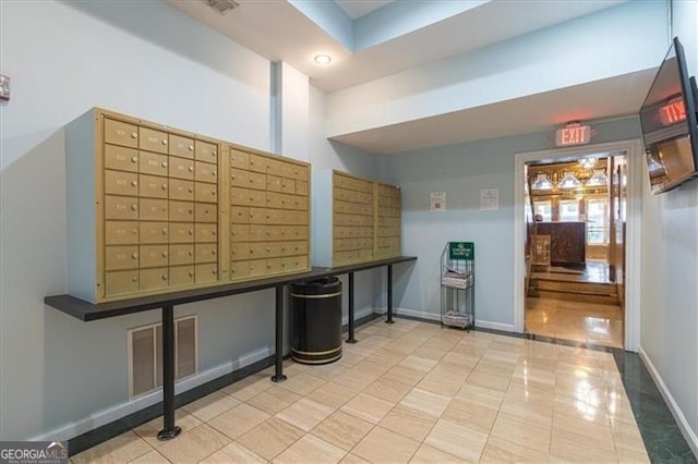 interior space with visible vents and mail area