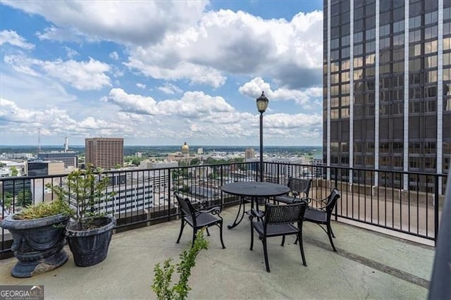 balcony featuring a city view