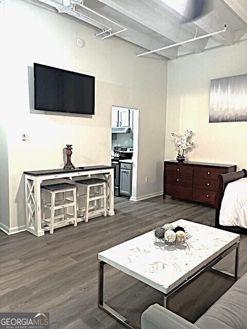 32 Peachtree St Unit 202, Atlanta, GA 30303 - living area with baseboards and wood finished floors