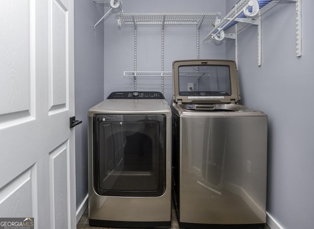 laundry room with laundry area and separate washer and dryer