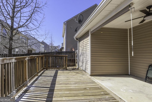 deck featuring fence and a ceiling fan