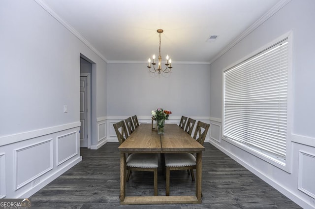 dining room featuring visible vents, a chandelier, dark wood-style flooring, and crown molding