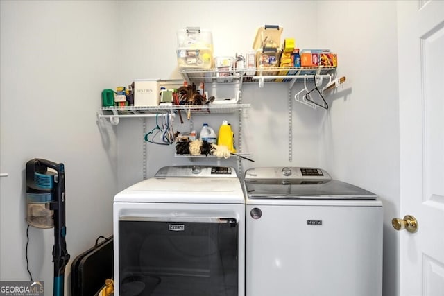 laundry area featuring laundry area and washing machine and dryer