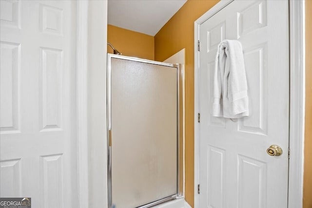 bathroom with a stall shower