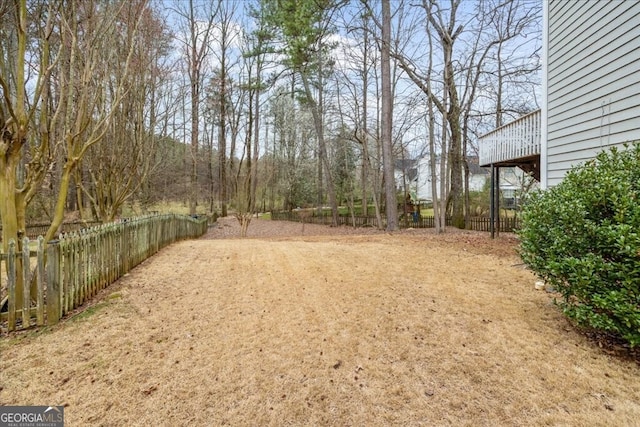 view of yard featuring fence