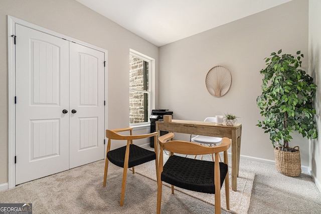 office with carpet floors and baseboards