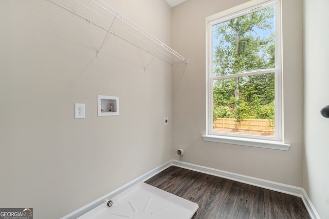 laundry room with laundry area, dark wood-type flooring, washer hookup, and baseboards