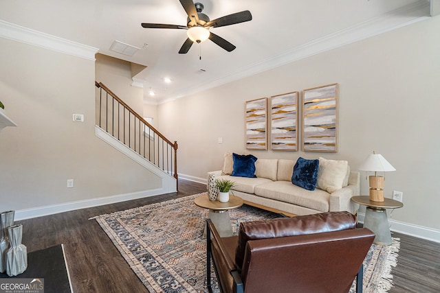 living area featuring visible vents, baseboards, ornamental molding, stairway, and dark wood-style floors