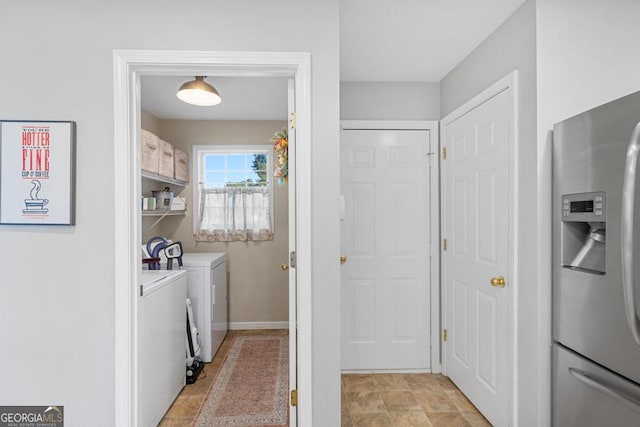 laundry room featuring laundry area and washer and clothes dryer