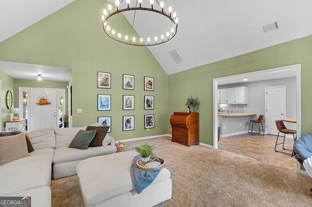 living room featuring high vaulted ceiling, baseboards, visible vents, and light carpet