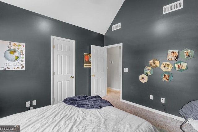 carpeted bedroom featuring visible vents, baseboards, and high vaulted ceiling