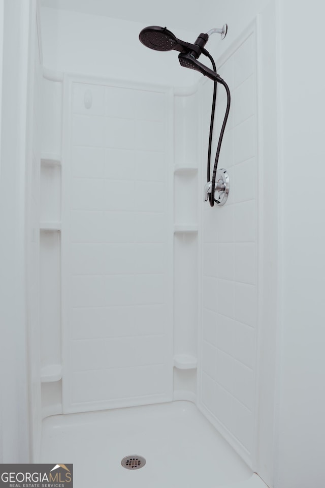 full bathroom with walk in shower