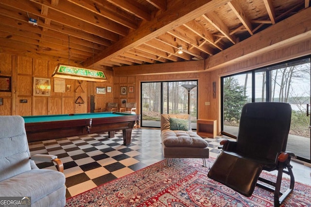 game room with billiards, wood walls, beamed ceiling, and tile patterned floors