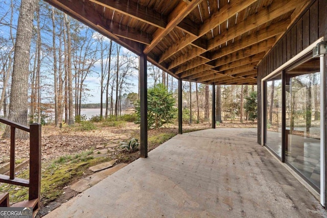 view of patio featuring a water view