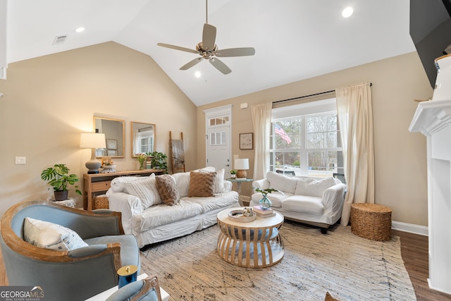 living room featuring high vaulted ceiling, a ceiling fan, wood finished floors, and recessed lighting