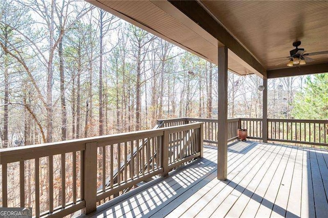 wooden terrace with ceiling fan