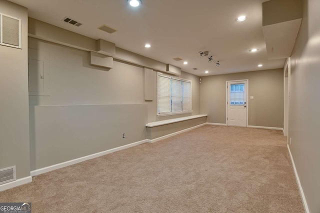 unfurnished room featuring recessed lighting, visible vents, carpet flooring, and baseboards