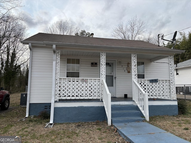 212 Nixon Ave SW, Rome, GA 30161 - bungalow-style house with covered porch and a shingled roof