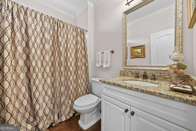 full bath featuring a shower with shower curtain, toilet, ornamental molding, vanity, and wood finished floors